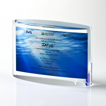 Financial tombstone made of clear acrylic glass curved on both sides.